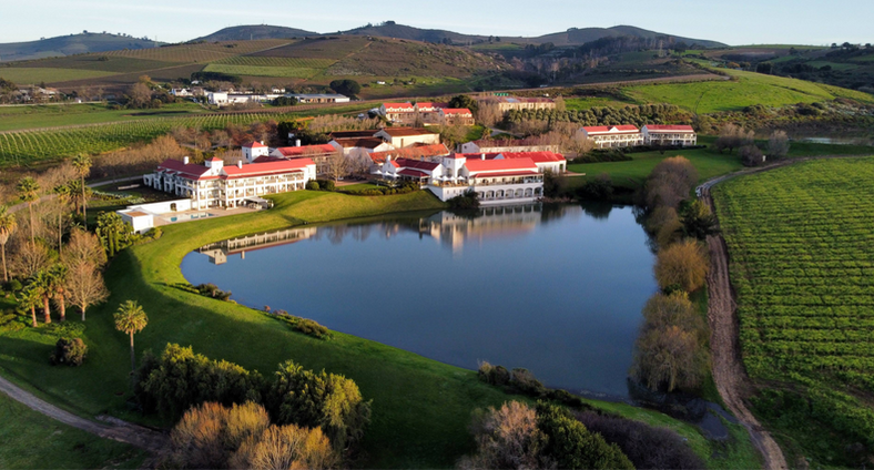 Asara Wine Estate and Hotel overlooking its dam and vineyards